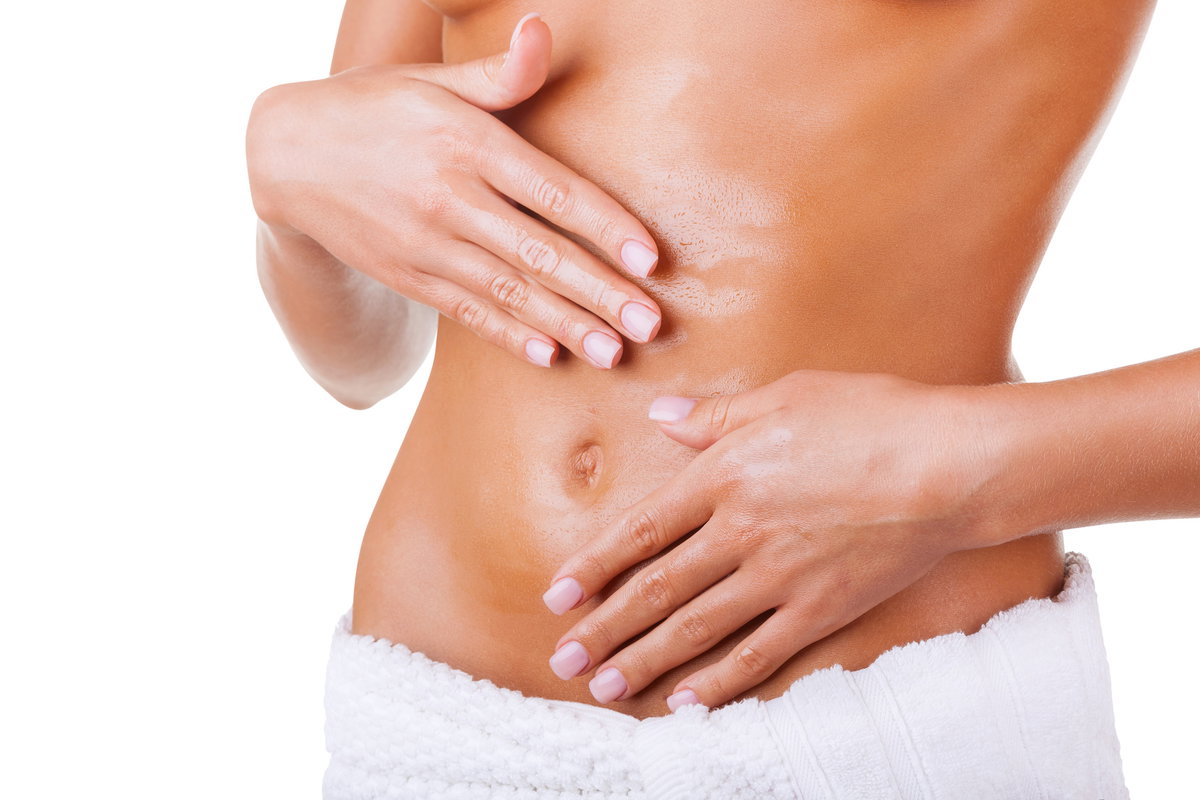 Massagen am Bauch sorgen für glatte Haut