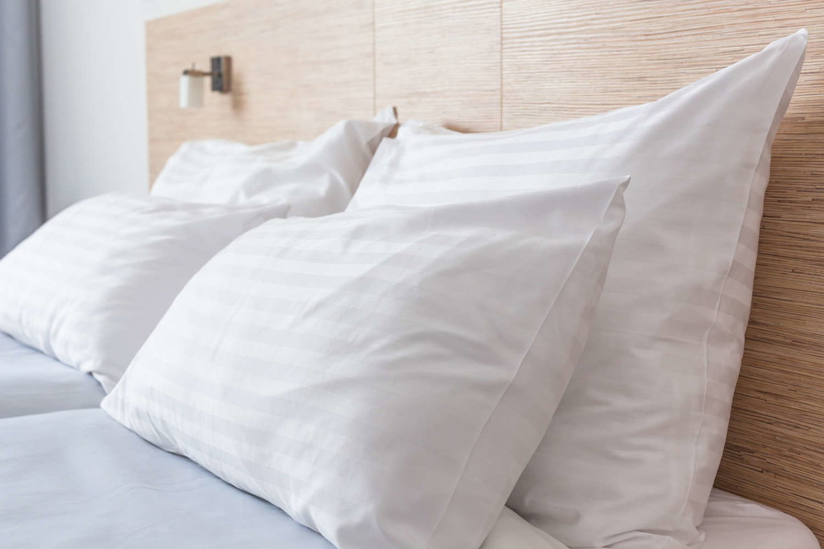 Kopfkissen im Bett