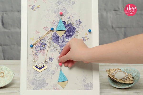 Make your own jewelry holder from picture frames